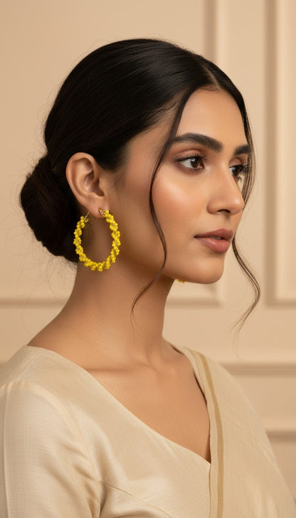 SHE BEAUTY Girlish Crystal Bali hoop earrings featuring vibrant yellow beaded texture worn by a woman
