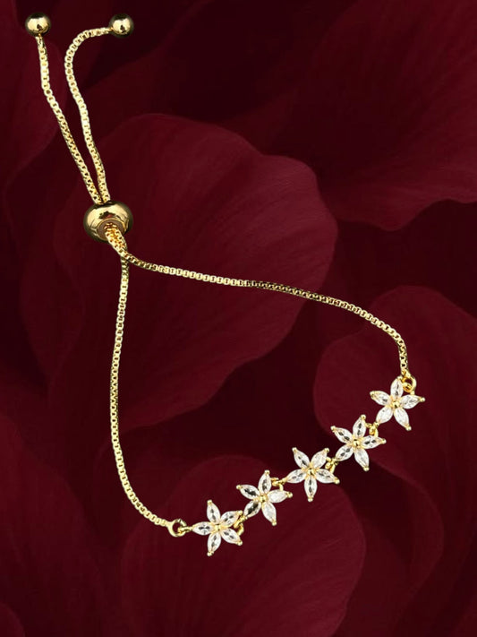 SHE BEAUTY gold-toned zirconia petal bracelet with adjustable slider chain, perfect for festive and party wear.