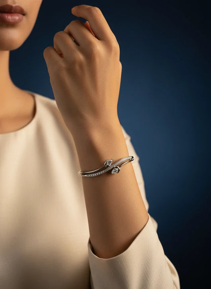 SHE BEAUTY anti-tarnish silver bracelet featuring sparkling zirconia stones on a model's wrist for festive wear.