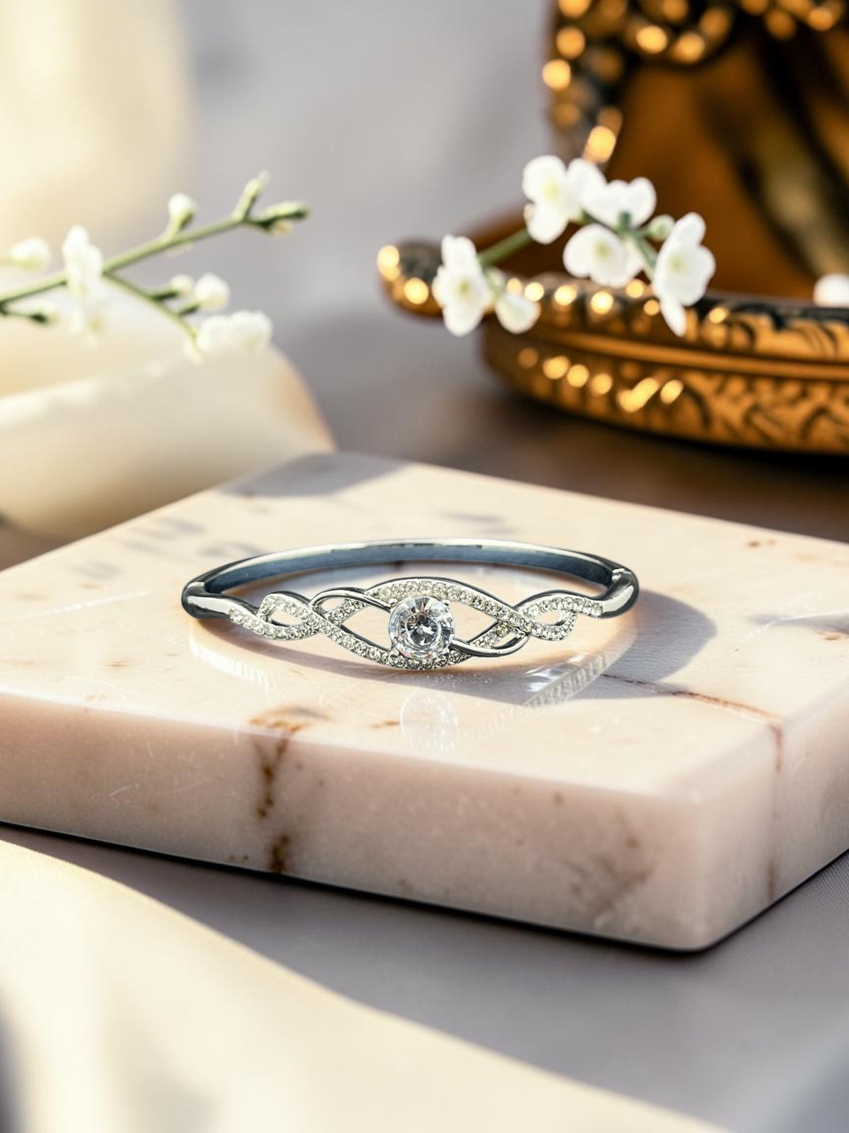 SHE BEAUTY anti-tarnish silver bracelet featuring a central zirconia stone and intricate pave-set crystal detailing.